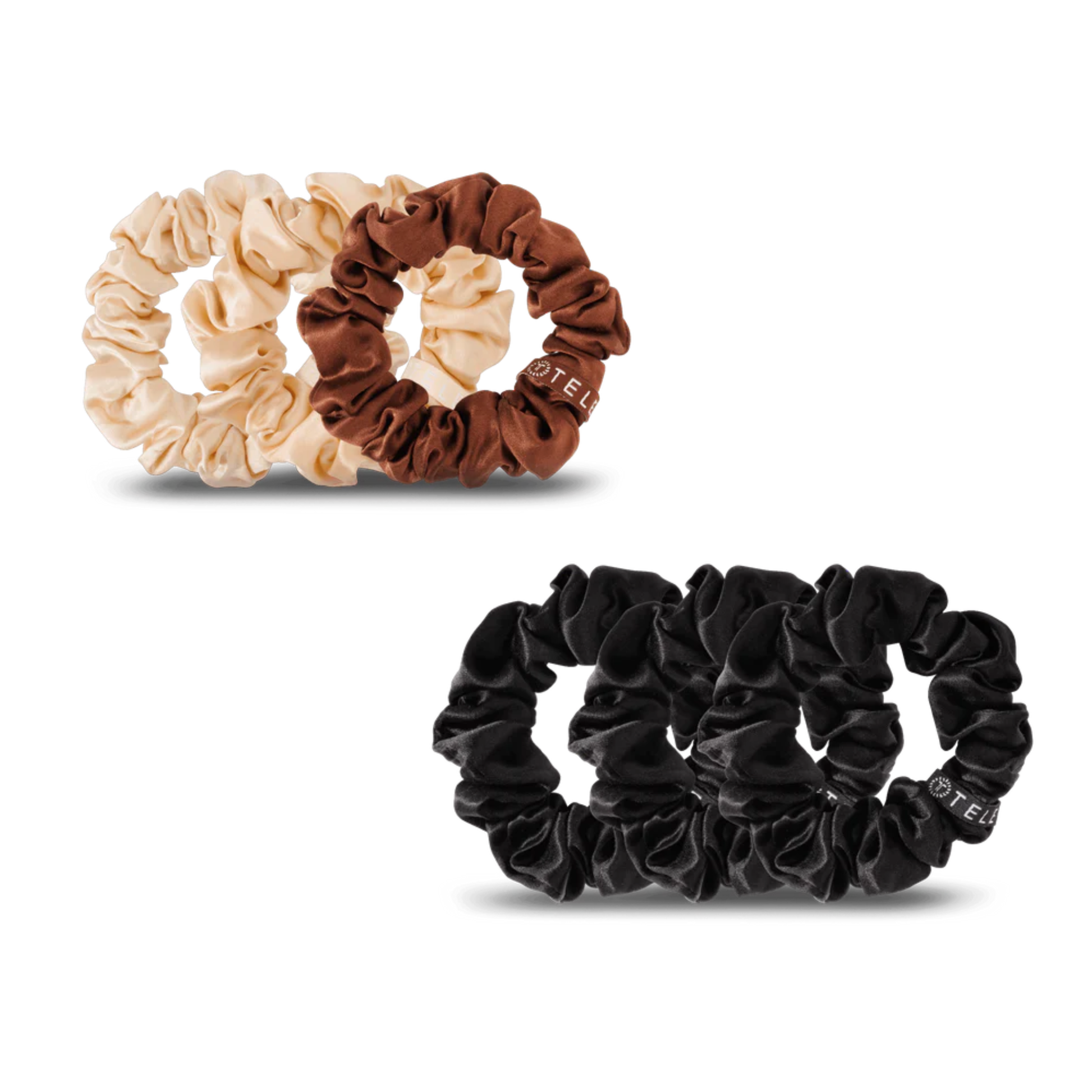 Elevate your hair care routine with Teleties Small Silk Scrunchies, designed to protect delicate strands while keeping your style intact. These luxurious silk scrunchies glide smoothly through hair, reducing breakage and frizz compared to traditional elastic bands. Available in two stunning finishes—Jet Black for a classic, sleek look and For The Love of Nudes for a versatile, neutral aesthetic. Perfect for everyday wear, workouts, or special occasions, these small scrunchies offer both function and eleganc