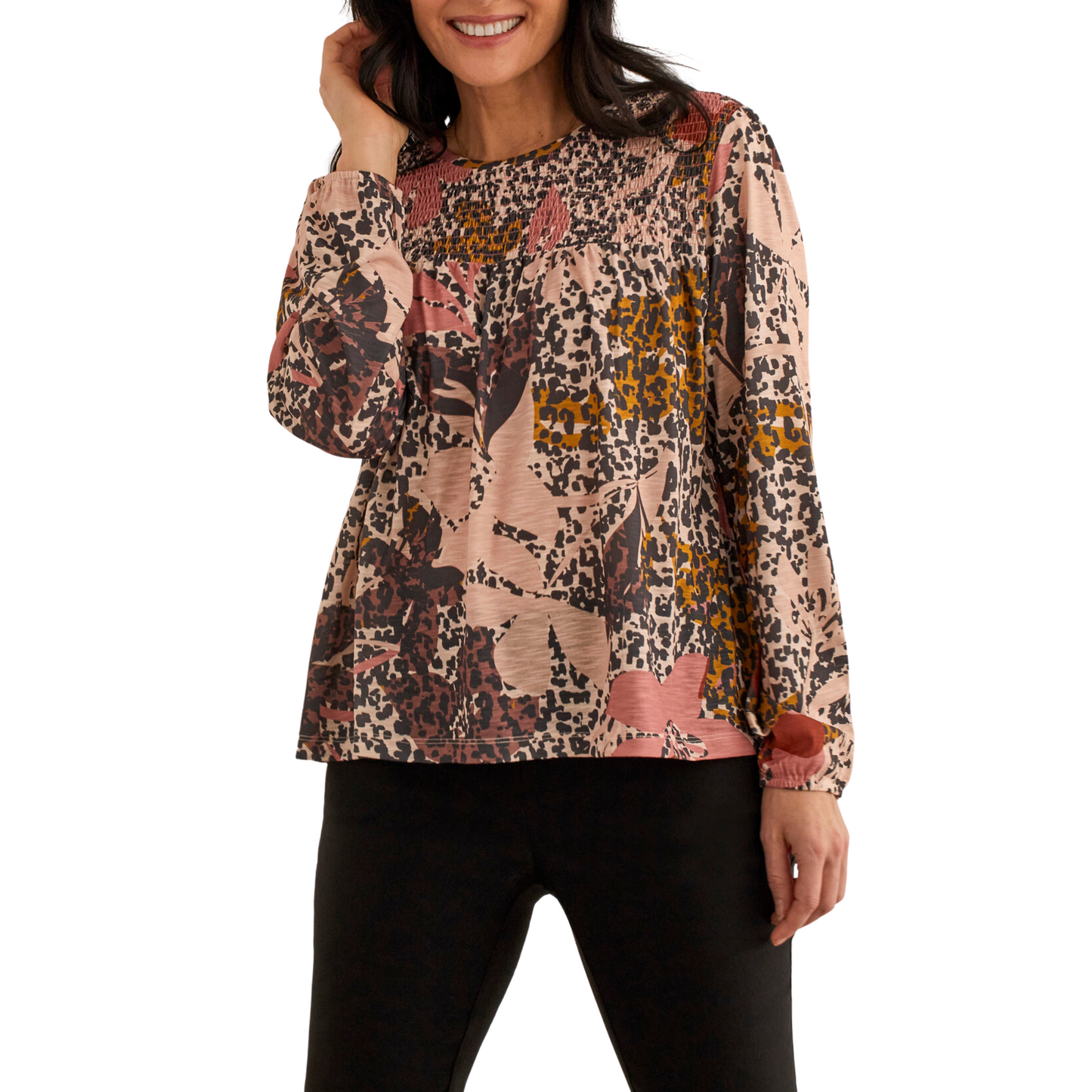 Stay warm and stylish with this brown Long Sleeve Smocked Top, featuring a beautiful floral pattern. The long sleeve and smocked design ensures comfortable wear, while still displaying a fashionable look. Perfect for any day or night event.