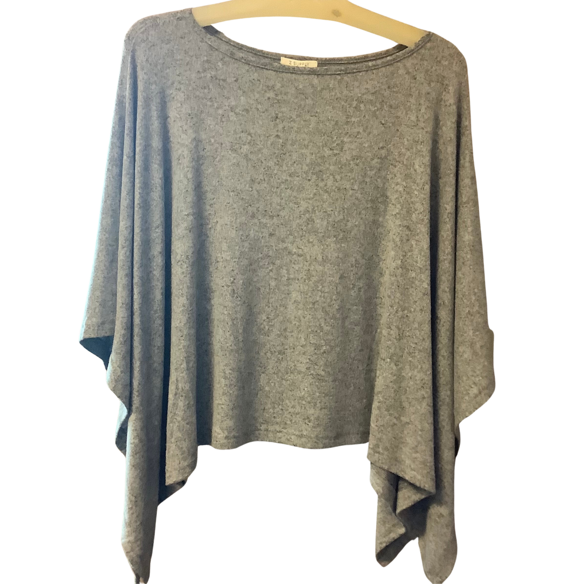 <p>This Soft Poncho is a must-have wardrobe staple, crafted from a breathable, lightweight fabric in a timeless grey hue. Perfect for any season, it allows you to add a layer of comfort without bulk.</p> <p>&nbsp;</p>