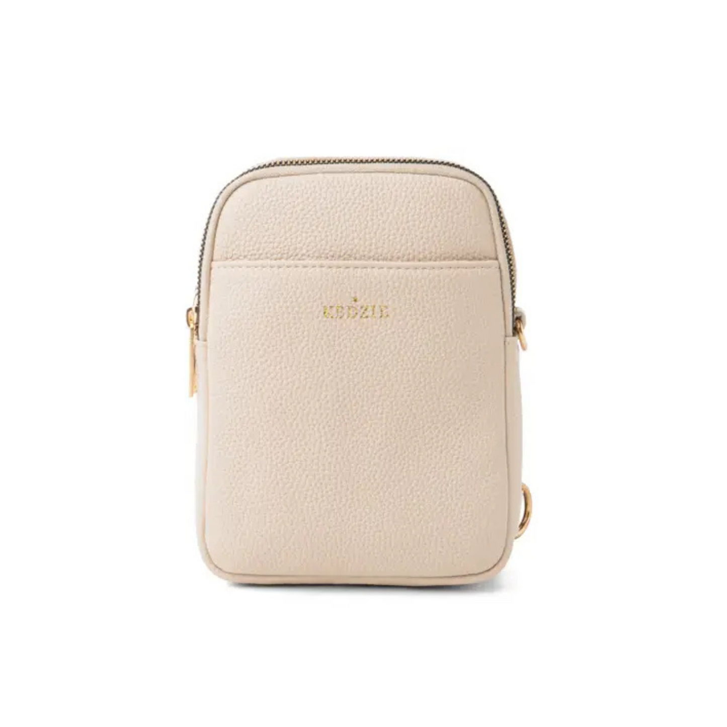 Experience the versatility and convenience of the Solstice Convertible Crossbody. This cream-colored, small purse from Kedzie brand easily transforms into a crossbody purse, making it the perfect accessory for any occasion. Stay stylish and organized with this must-have accessory.