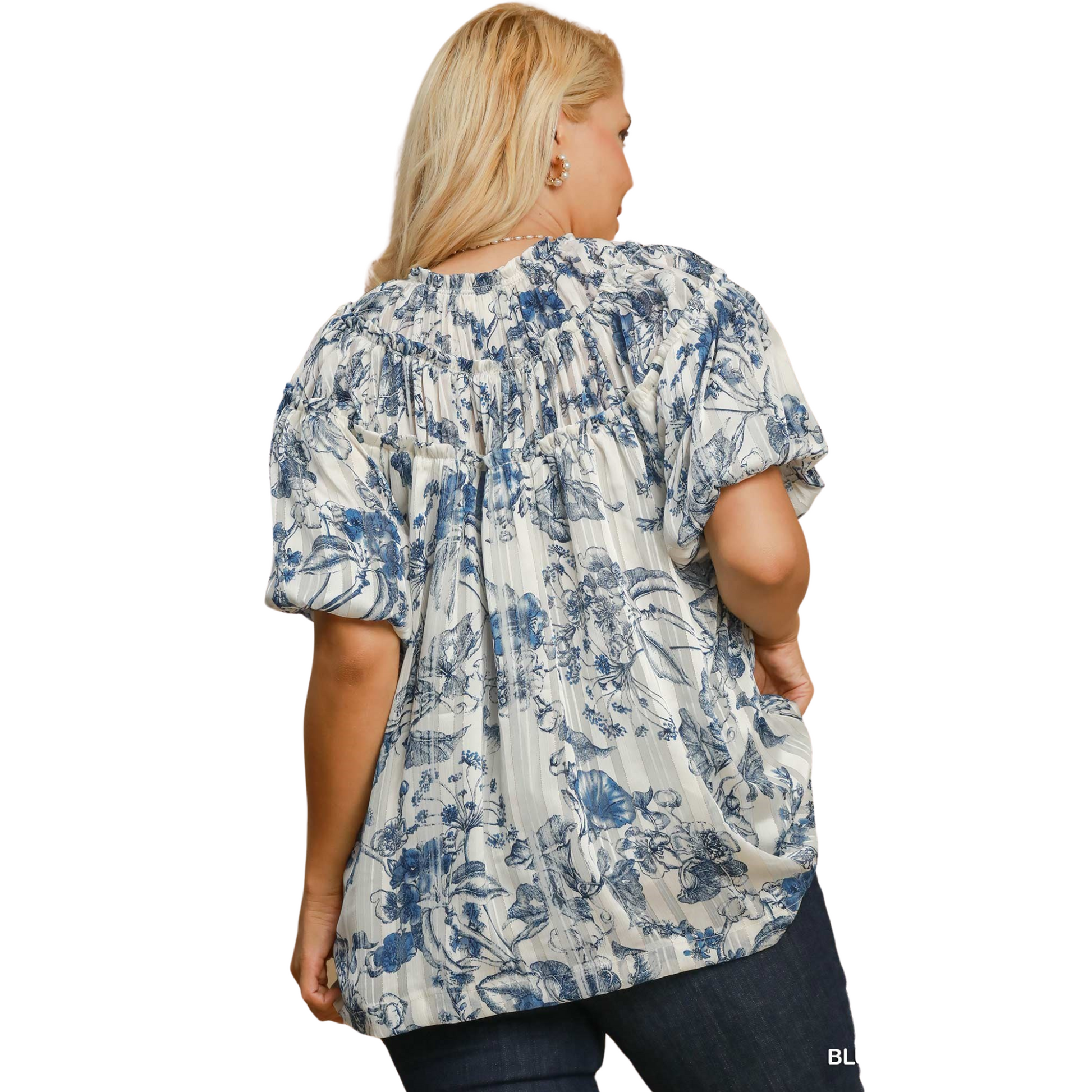 This Umgee brand Floral Split Neck Top features a beautiful blue floral print, perfect for adding a unique touch to your plus-size wardrobe. The short sleeves add a touch of comfort, making it an ideal choice for any occasion. Elevate your style with this stunning top.