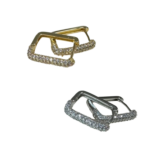 Upgrade your earring game with our Square Rhinestone Hoops. Available in silver or gold, these hoops add a touch of sophistication to any outfit. The rhinestone accents and square design make for a stunning and trendy combination. Elevate your style today.