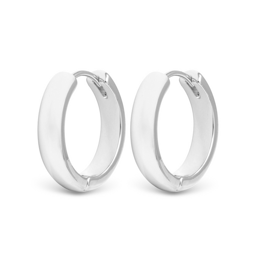 Expertly crafted from high-quality silver, the Stacy Small Hoops are a versatile and elegant accessory for any occasion. With a classic design, these small hoops will add a touch of sophistication to any outfit. Perfect for those who appreciate timeless style and expert craftsmanship.