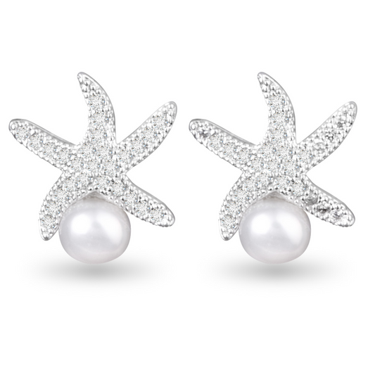 These silver stud earrings feature a delicate starfish design with rhinestone accents, highlighting a single pearl. Add a touch of elegance and seaside charm to any outfit with these starfish and pearl studs.