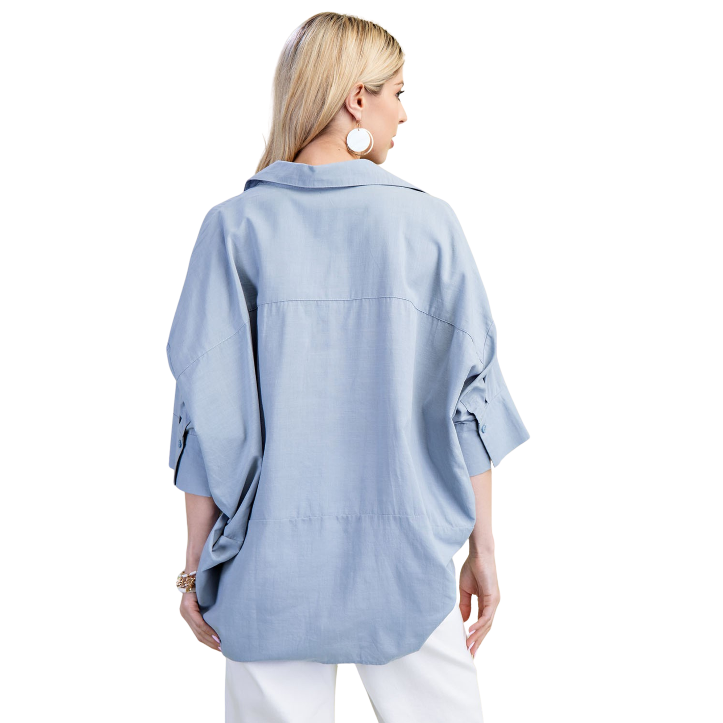 Lightweight V-Neck Popover Top in steel blue by GiGio. This versatile piece features a classic collared design with a flattering v-neckline and half sleeves, perfect for layering or wearing solo. The breathable fabric keeps you comfortable throughout the day, while the polished popover style transitions effortlessly from casual to professional settings. A wardrobe essential that pairs with everything.