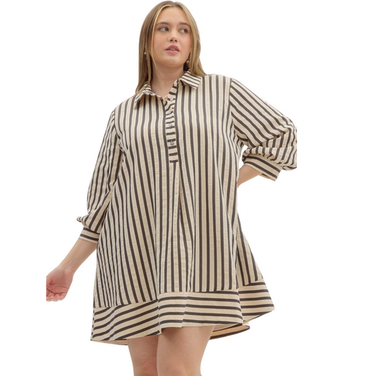 Introducing our Striped Seersucker Mini Dress! Elevate your wardrobe with this pullover dress featuring 3/4 bubble sleeves and a collared half button front closure. With pockets on the side and a lightweight, non-sheer fabric, you'll stay stylish and comfortable all day long. Perfect for any occasion, this dress is a must-have addition to your collection.