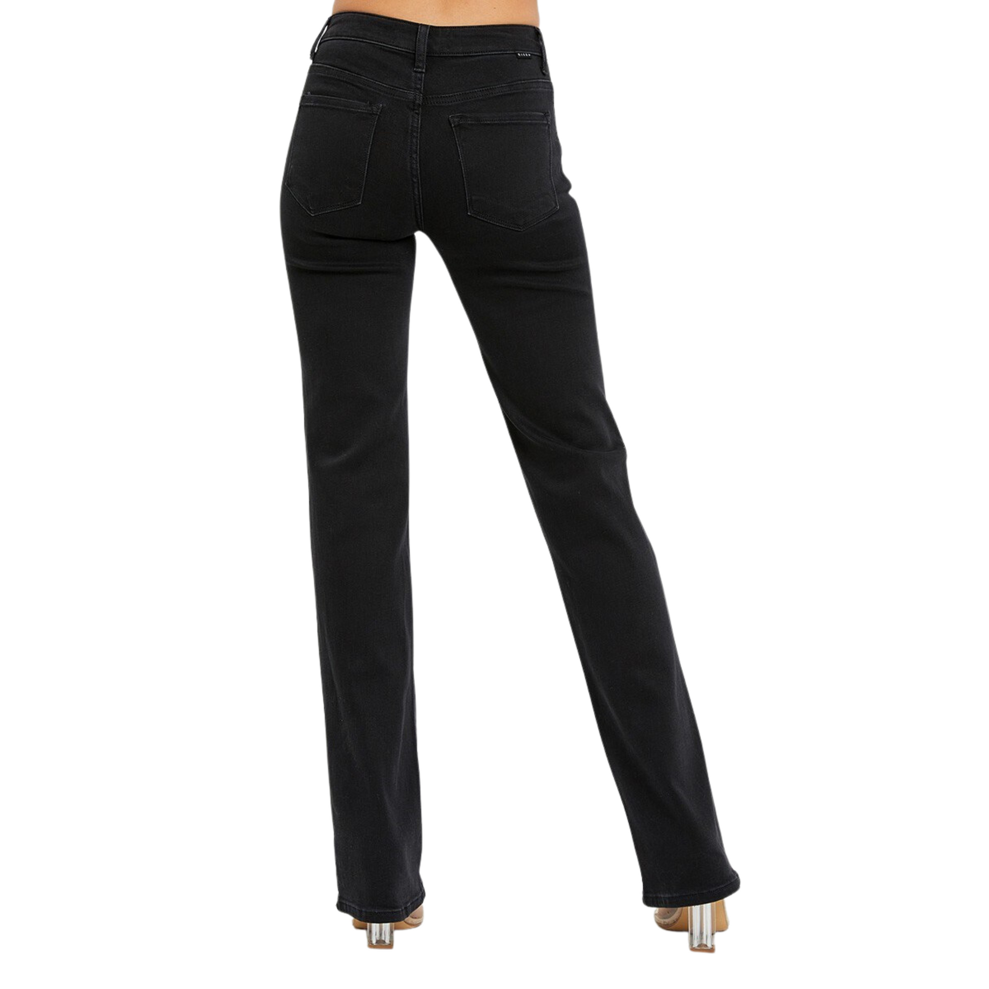 Risen's Mid Rise Slim Straight Jeans combine a classic cut with modern styling. The mid-rise waist enhances comfort and offers a sleek silhouette. In a timeless black color, these jeans can be styled for any occasion.