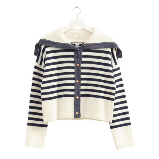 This expertly crafted Sailor Collar Sweater from HYFVE features a classic cream and blue striped pattern. Its distinctive sailor collar adds a timeless nautical touch, while the button-up front ensures easy wear and a tailored fit. Perfect for layering, this sweater combines vintage-inspired style with modern comfort for a versatile wardrobe staple.
