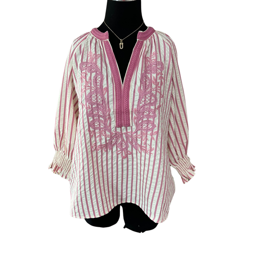 Elevate your everyday wardrobe with this charming Entro striped top. Featuring a flattering V-neckline and three-quarter length sleeves, it's designed for comfort and style. Delicate embroidered accents add a touch of sophistication to the classic pink striped pattern. Perfect for casual outings or layering, this versatile piece transitions seamlessly from day to night.