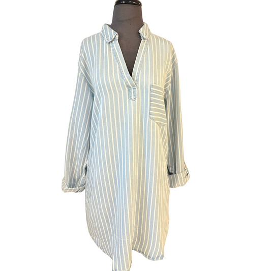 This Striped Mini Shirt Dress is perfect for the fall! It features a striped tab sleeve and a mini shirt dress in Chambray Multicolor, giving you a stylish and airy look that is perfect for any occasion.