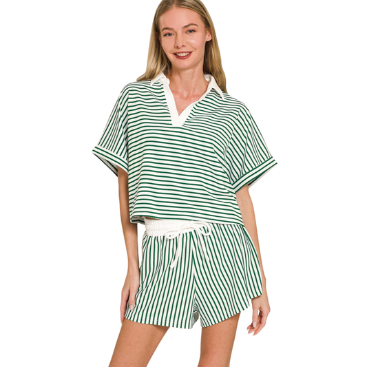 Elevate your casual wardrobe with this timeless striped collared top and shorts set in rich hunter green. The short sleeve top features a classic collar and coordinating striped pattern, paired with comfortable matching shorts for an effortless, put-together look. Perfect for warm weather outings, weekend relaxation, or layering under jackets. The structured yet breathable design keeps you cool and confident all day long.