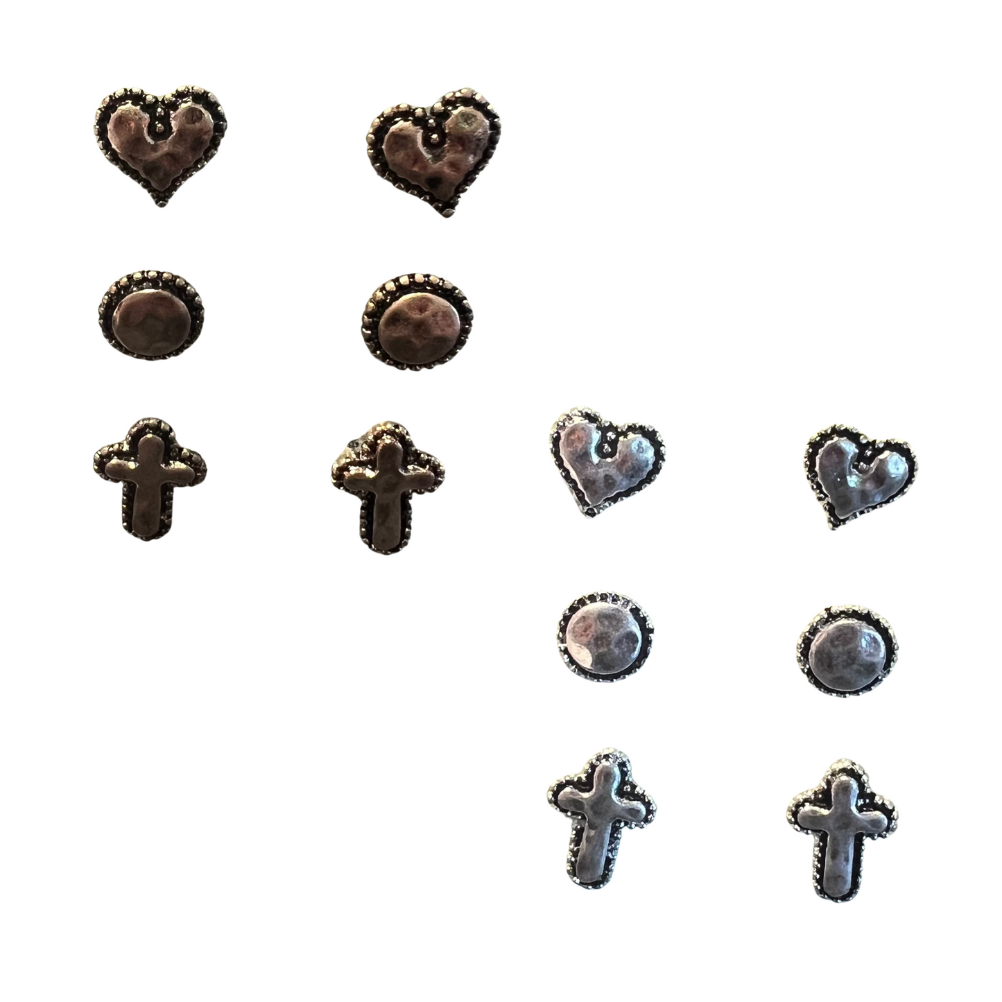 This stylish set of three stud earrings subtly express your individual style. Made of silver and gold colors, each earring defines your look with a distinct heart, circle, or cross shape. Whether wearing one, two, or all three earrings together, you are sure to make a statement.