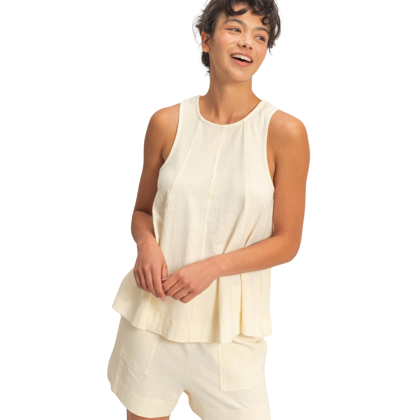 Effortless comfort meets casual style with this HYFVE tank and shorts set. The soft cream color creates a versatile, neutral foundation perfect for warm weather layering or standalone wear. The sleeveless tank top offers breathable simplicity, while the coordinating shorts provide an easy, put-together look. Ideal for lounging, running errands, or relaxed weekend outings. Complete your wardrobe with this timeless two-piece set.