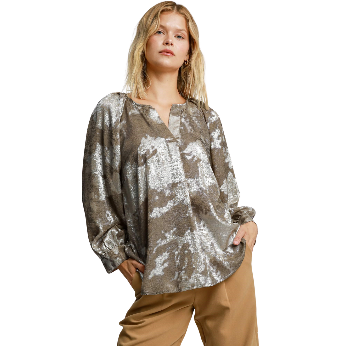 Expertly crafted by Umgee, this Metallic V-Notched Top features a stunning taupe color and abstract print, perfect for adding a touch of elegance to any ensemble. The v-neck and bubble sleeve design offer a flattering fit and comfortable wear. Elevate your wardrobe with this stylish, high-quality top.