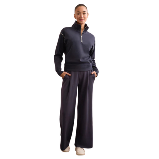 Crafted for comfort and style, the Techno Lux Wide Leg Pants from Tribal feature a soft navy fabric that drapes effortlessly. Their pull-on design ensures easy wear, while the wide leg cut offers a modern silhouette and unrestricted movement, making them ideal for both casual and elevated looks.