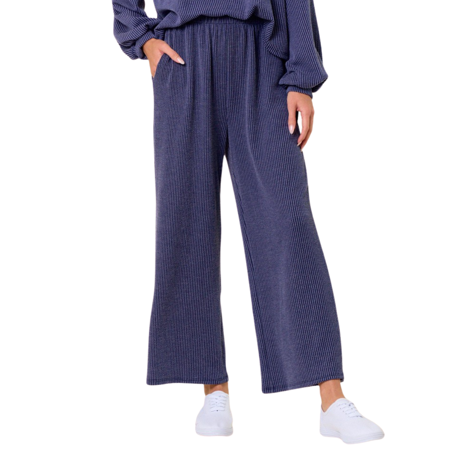 Textured Pants by Lovely Melody feature a comfortable elastic waistband for easy movement and all-day wear. The navy color offers versatile styling options that pair effortlessly with any wardrobe. Quality construction ensures durability and lasting comfort.