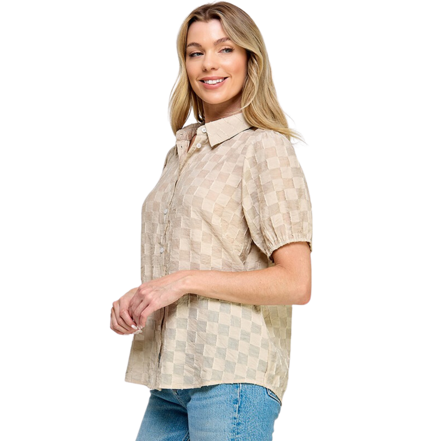 This Textured Short Sleeved Top is made of a cream-colored, textured cotton fabric, featuring a collared neckline with button up closure. Perfect for any occasion, this timeless piece offers a classic look with a touch of modern texture.