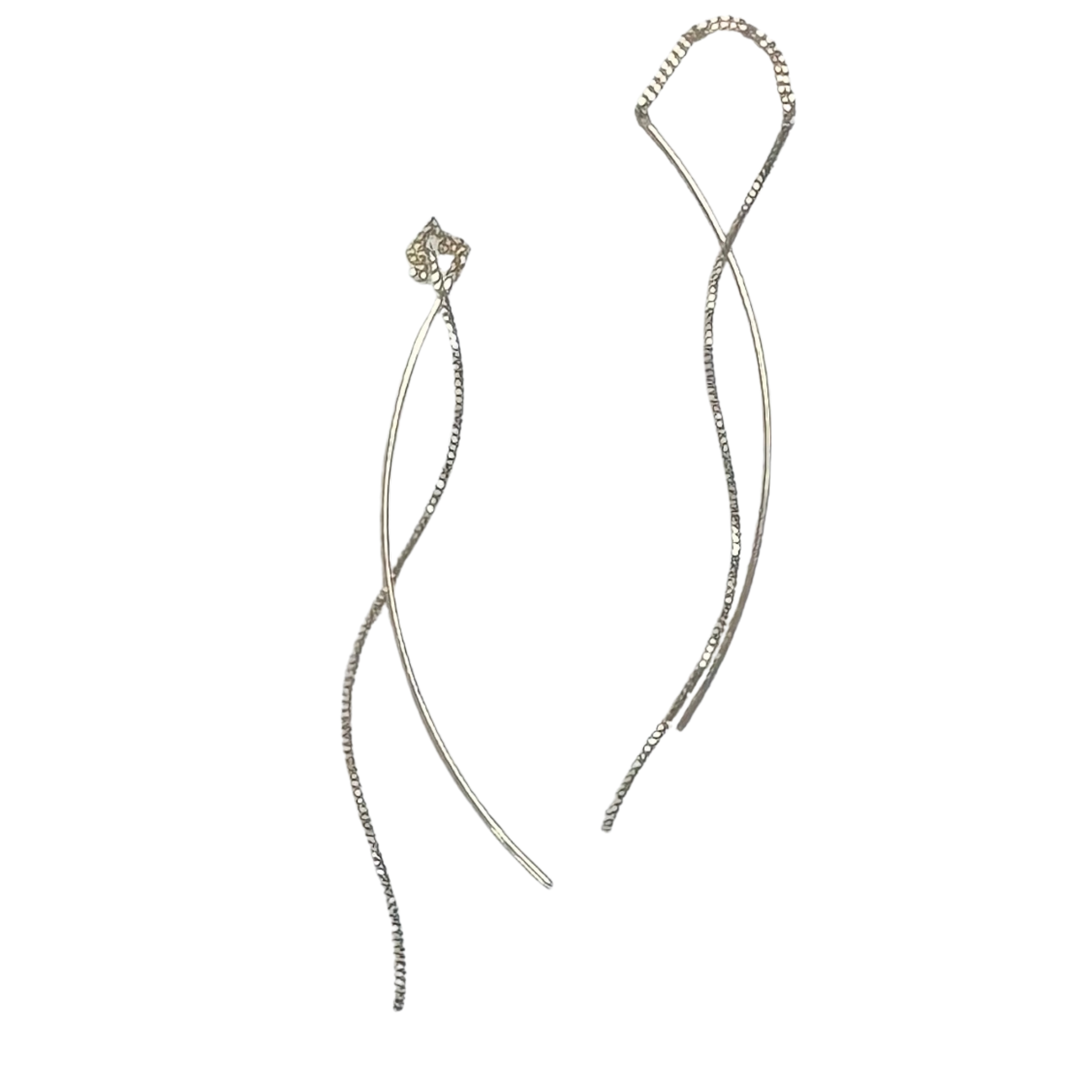 Perdido Gems Dangle Earrings feature an elegant gold construction with a delicate string design that catches light beautifully. These earrings combine sophisticated style with comfortable wear, perfect for everyday elegance or special occasions. The graceful dangle movement adds dimension and charm to any look.