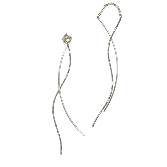 Perdido Gems Dangle Earrings feature an elegant gold construction with a delicate string design that catches light beautifully. These earrings combine sophisticated style with comfortable wear, perfect for everyday elegance or special occasions. The graceful dangle movement adds dimension and charm to any look.