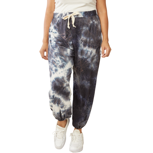 These Tie Dye Joggers have a unique black and white color that will make any outfit stand out. With elastic waist and cuffed hem, they provide a comfortable, breathable fit. Perfect for jogging, lounging, or anytime you need to make a statement.