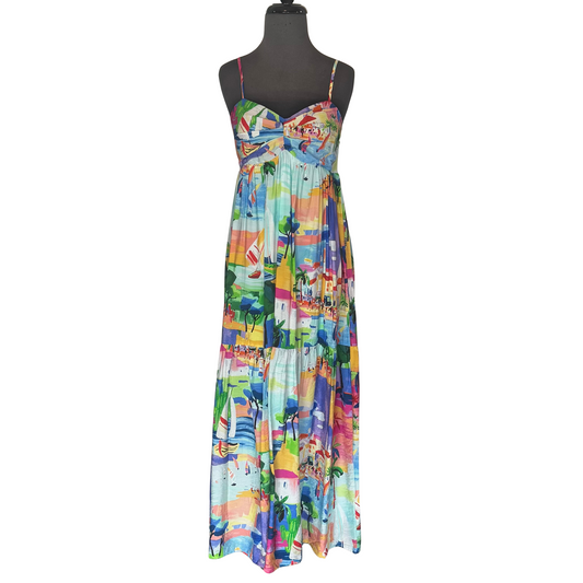 This multicolor tiered maxi dress from Fore Collection features delicate spaghetti straps and a smocked bodice for a comfortable, flattering fit. Its flowing tiers create elegant movement, making it an ideal choice for warm-weather occasions or stylish everyday wear. The combination of smocking and tiered design enhances both comfort and visual appeal, offering a sophisticated yet relaxed silhouette.