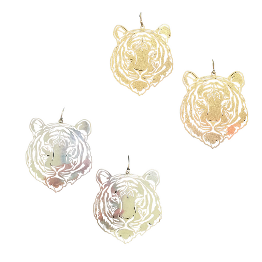 These Tiger Filigree Earrings boast an elegant worn gold finish, featuring intricate filigree detailing. Crafted in a stylish tiger shape, these dangle earrings are the perfect accessory for any fashionable outfit. Add a touch of sophistication and wild flair to your look.