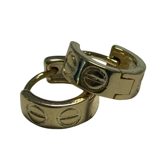 These Tiny Hoops from Golden Stella offer a refined touch of elegance with their delicate gold finish. Expertly crafted for everyday wear, their subtle size ensures versatility, complementing any style without overpowering. Ideal for those seeking understated sophistication, these hoops provide a timeless accessory that enhances your look with effortless grace.