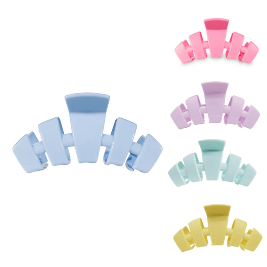 The Teletie Tiny Hair Claw offers a secure hold for those who need a subtle hair accessory. Available in a variety of colors, these petite accessories add just the right touch to any look. The strong hold ensures your hair stays in place, even in windy conditions.