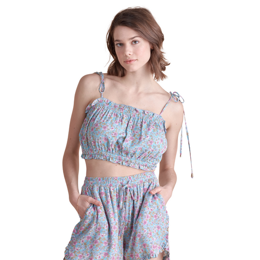 This woven bubble top and bottom set features a beautiful floral print and is designed as a two piece set. The cropped top and maxi skirt combine for a stylish and comfortable outfit option. Perfect for a day out or a casual event, this set is a must-have for any fashion-forward individual.