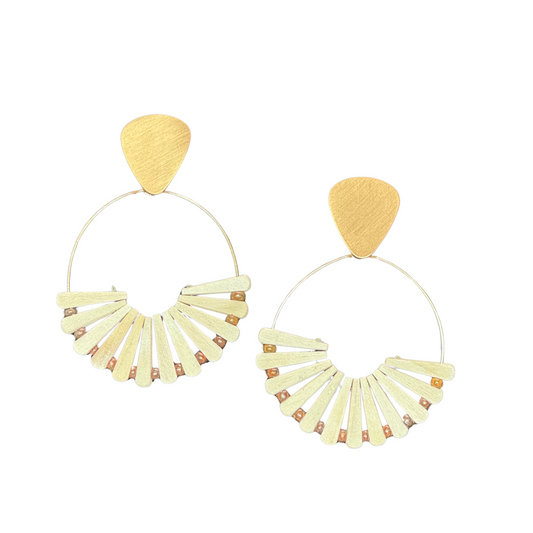 Elevate your accessory collection with the Tribal Hoop Earrings by Golden Stella. Featuring a refined gold finish and intricate tribal-inspired patterns, these earrings combine timeless elegance with cultural artistry. Their lightweight design ensures comfortable wear, while the bold detailing adds a distinctive touch to both casual and formal ensembles. Perfect for those who appreciate expert craftsmanship and meaningful style.