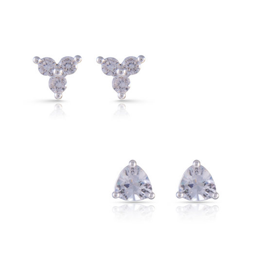 Expertly crafted with high-quality silver, these Trillion Duo Stud Earrings are a must-have for any fashion-forward individual. Adorned with sparkling rhinestones, the set of two stud earrings will elevate any outfit with a touch of elegance and sophistication. Perfect for any occasion, these earrings are a versatile addition to your jewelry collection.