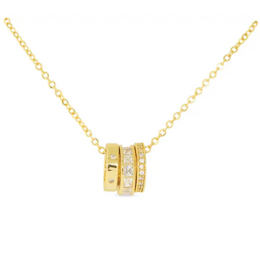 This elegant gold short necklace from Amanda Blu features a distinctive three-ring design, combining modern style with timeless sophistication. Crafted to sit gracefully around the neck, it offers a subtle yet striking accent to any outfit, perfect for layering or wearing alone for a refined look.