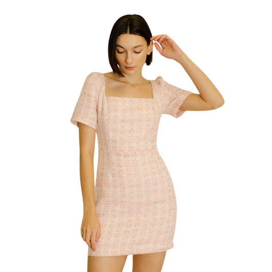 This Plaid Tweed Bodycon Dress is designed for the confident woman. The blend of pink and soft colored tweed fabric hugs your body tightly, creating a stylish silhouette that is sure to turn heads. An essential for any fashionista's wardrobe!