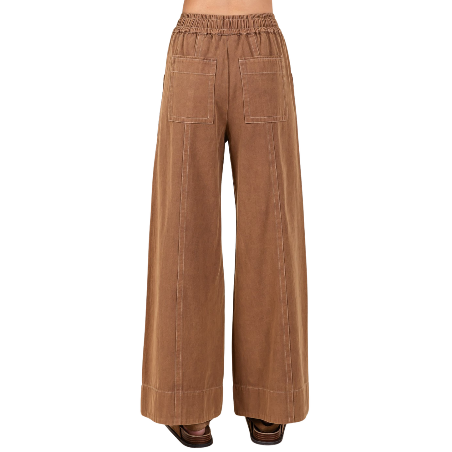 Mineral Wash Twill Pants in a rich cocoa color combine comfort and style with expert craftsmanship. Featuring a wide-leg cut and a soft twill fabric, they offer a relaxed yet polished fit. The elastic waist and adjustable drawstring ensure a customizable, secure fit for all-day wear. Perfect for versatile wardrobe layering, these Mittoshop pants bring effortless sophistication to casual and refined looks alike.