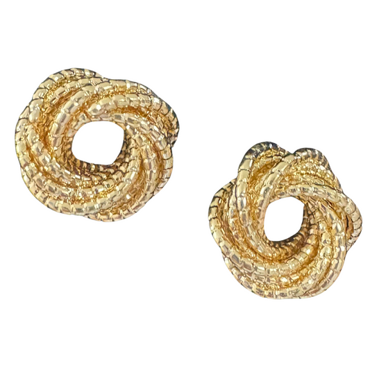 The Twisted Wreath Studs by Euro Collection add a touch of elegance to any outfit. Made with a stunning gold twisted design, these stud earrings are the perfect accessory for any occasion. Elevate your style with these timeless pieces.