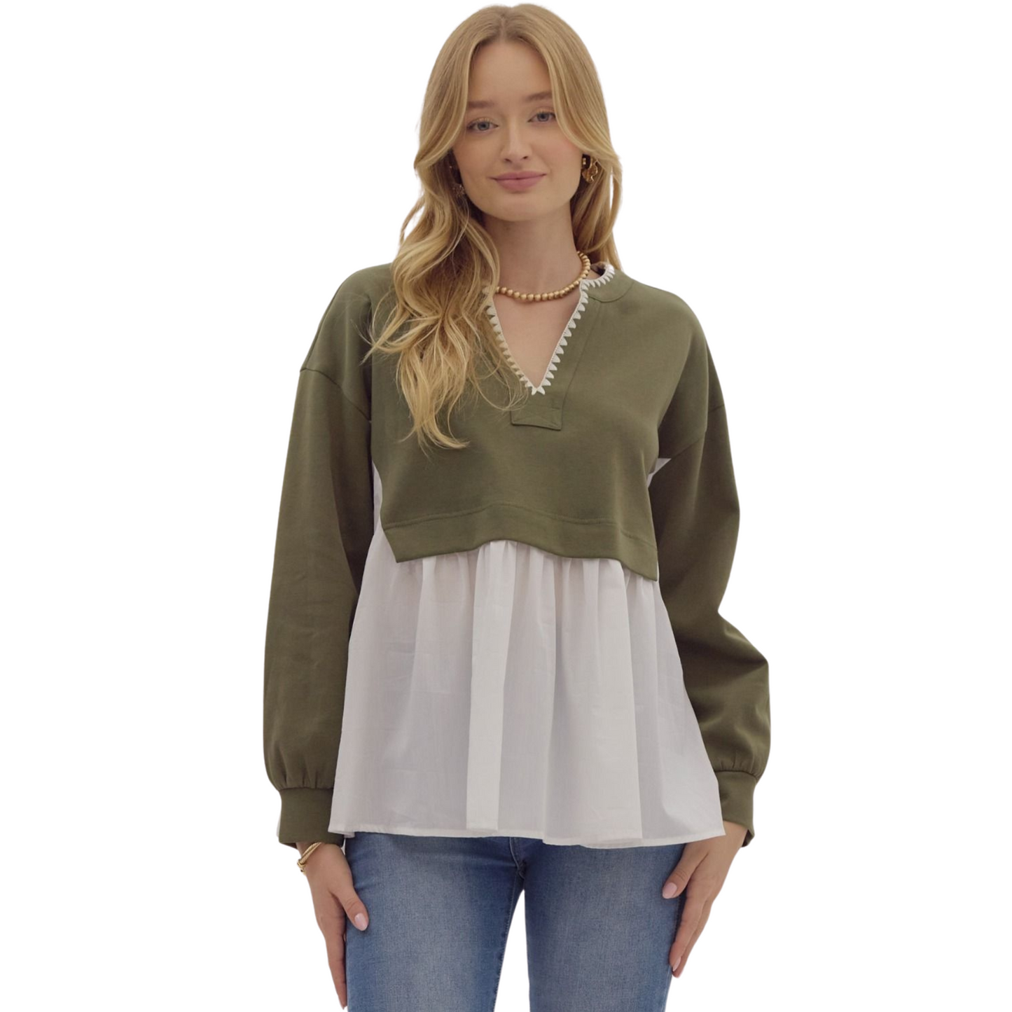 This solid long sleeve twofer henley pullover top combines style and comfort with its unique design and cozy knit material. The blanket stitch at the neckline adds a touch of detail to this olive colored top. Lightweight and non-sheer, this top is perfect for any occasion.