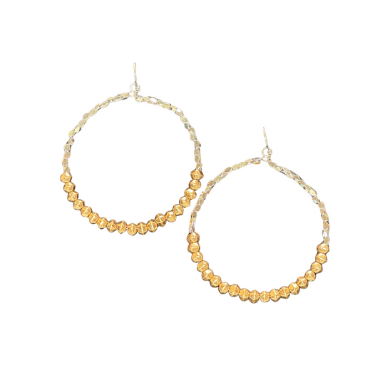 These Two Tone Hoop Earrings from Golden Stella expertly combine the timeless elegance of gold and silver, offering versatile wear to complement any outfit. Crafted with precision, their lightweight design ensures comfort without sacrificing style. Perfect for those who appreciate subtle sophistication, these hoops add a polished finish to both casual and formal looks.