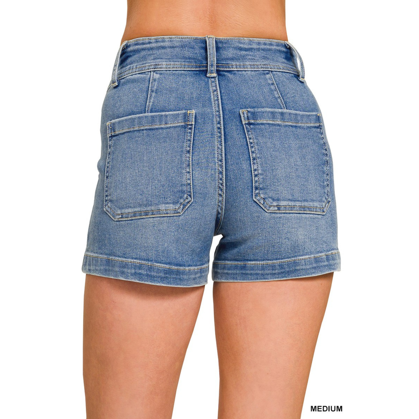 Classic medium wash denim shorts from Zenana designed for everyday versatility. Featuring practical utility pockets for functional style, these shorts offer a comfortable fit perfect for casual outings, weekend adventures, or laid-back days. The timeless medium wash pairs effortlessly with any wardrobe staple, making them an essential addition to your collection.