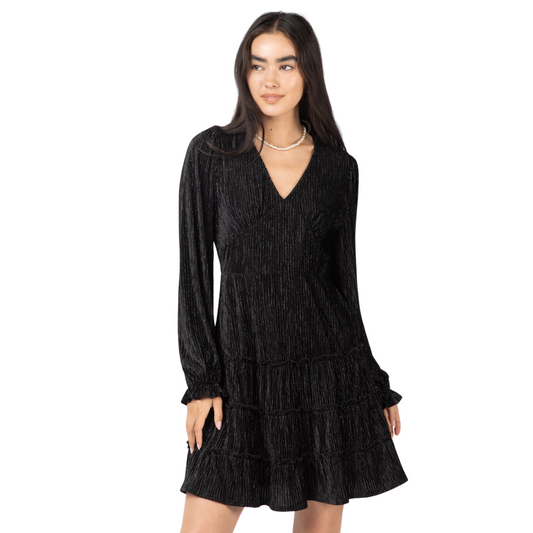 This Deep V-Neck Textured Velvet mini dress is a perfect holiday dress for your date night or party. It features a deep V-neck and long sleeve design, along with ruffled tiered layers and a back zipper closure. It's made with a textured velvet fabric in black for an elegant look.