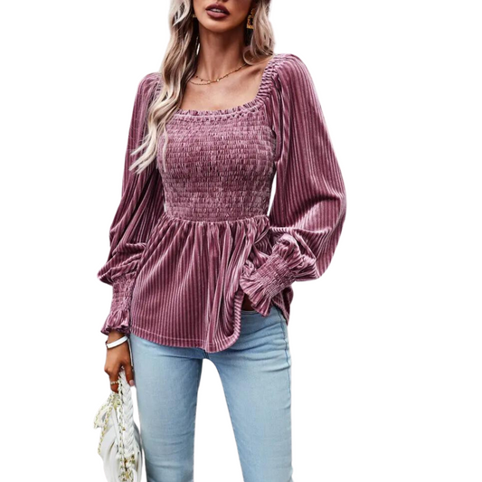 Bring a touch of elegance to any outfit with this dark mauve Velvet Smocked Peplum Top. Desgined with long sleeves and a square neck for a classic look, this top is crafted from luxurious velvet for a stylish finish. Highlighted by beautiful smocking, this top is perfect for any special occasion.