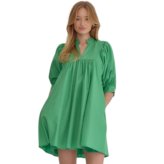 Expertly crafted with a solid v-neck and half sleeves, this mini dress exudes effortless elegance. The button closure at the cuff and pockets at the sides add functionality to the stylish design. Lightweight, non-sheer, and lined for comfort, this woven dress is the perfect addition to your wardrobe.