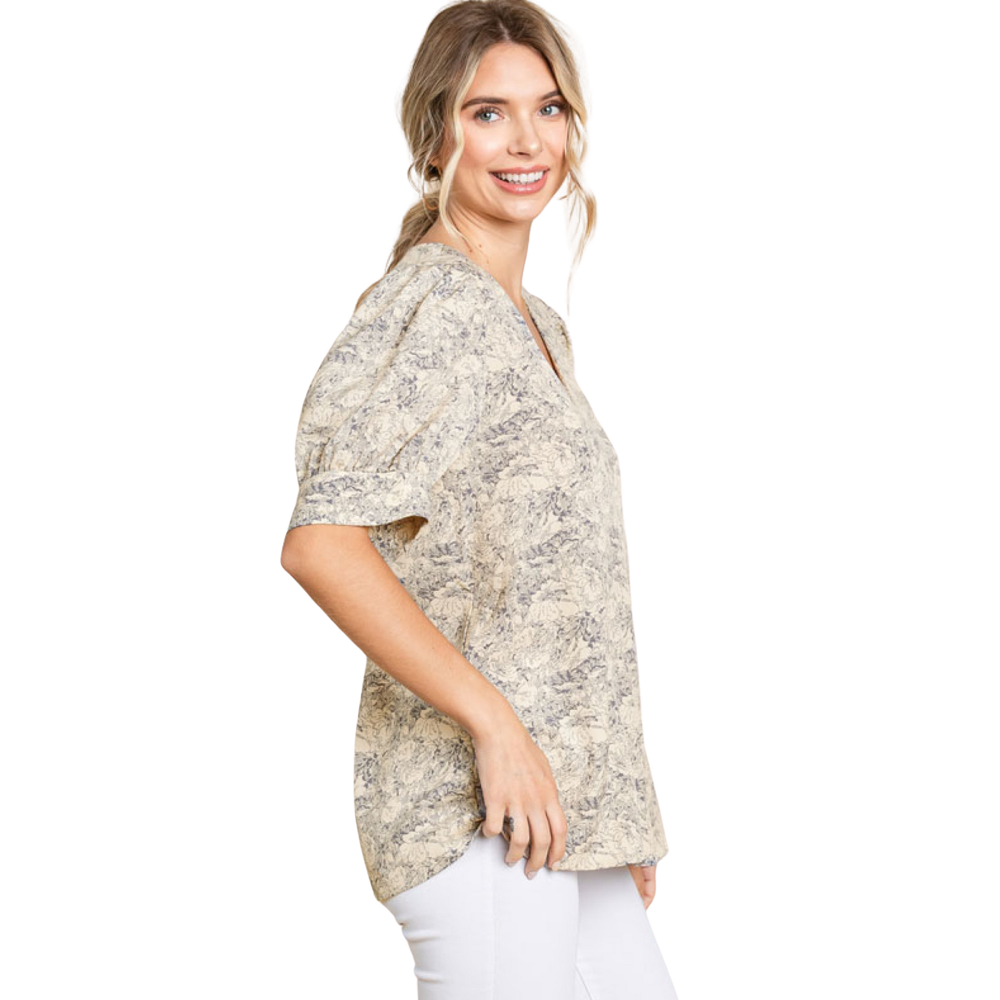 Introduce elegance into your wardrobe with our Jacquard pattern print top. Featuring a flattering V-neckline, short peasant sleeves, and buttoned cuffs, this unlined and non-sheer top is both lightweight and versatile. The natural color adds a touch of sophistication to any outfit.