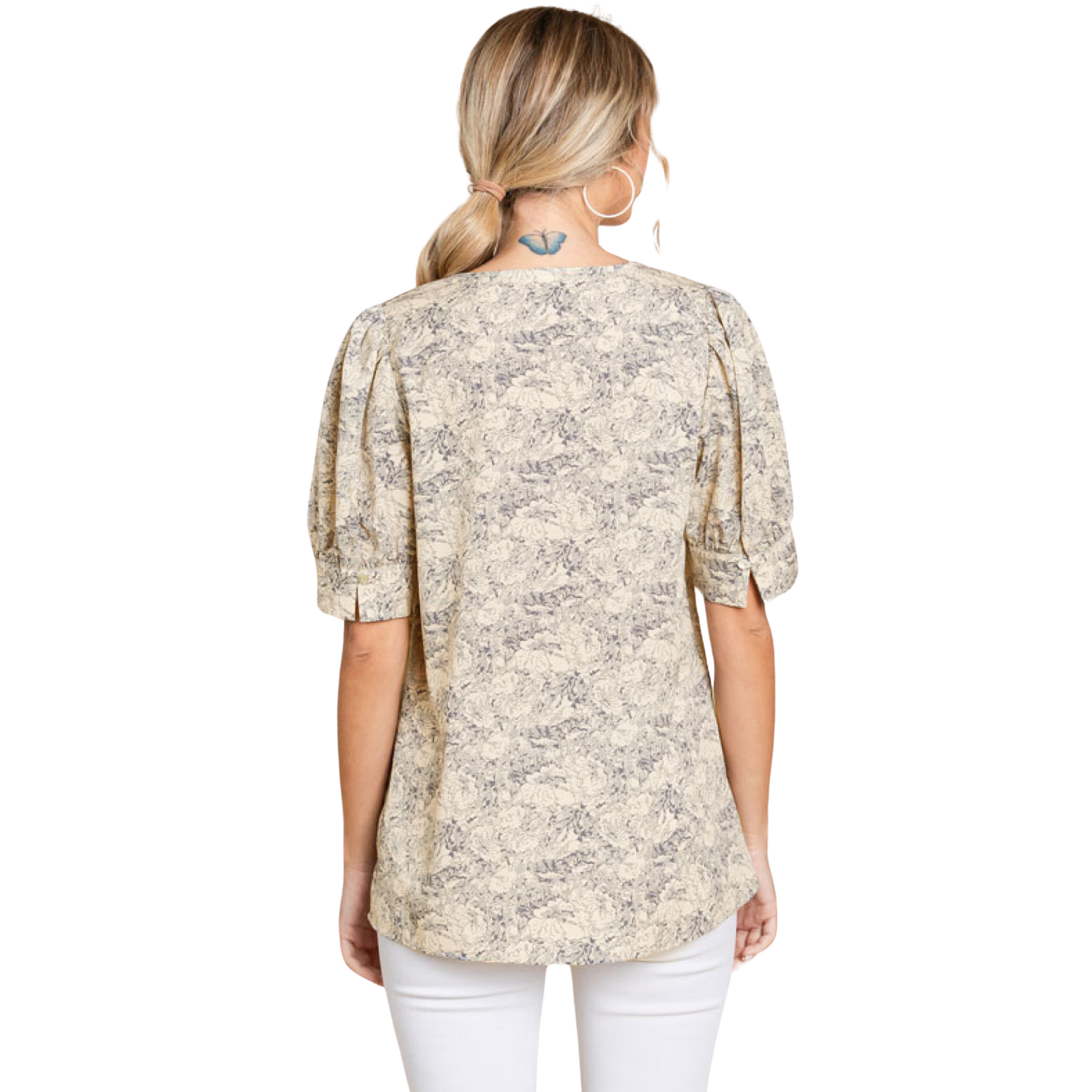 Introduce elegance into your wardrobe with our Jacquard pattern print top. Featuring a flattering V-neckline, short peasant sleeves, and buttoned cuffs, this unlined and non-sheer top is both lightweight and versatile. The natural color adds a touch of sophistication to any outfit.
