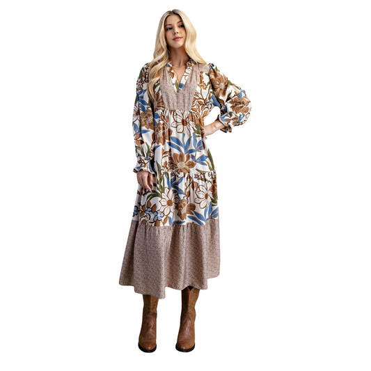 This GiGio brand midi dress features a sophisticated tiered design in a walnut color mix that adds subtle depth and richness to your look. The flattering V-neckline enhances elegance while the flowy silhouette ensures comfortable wear throughout the day or evening. Perfectly balancing style and ease, this dress is ideal for both casual outings and polished occasions.