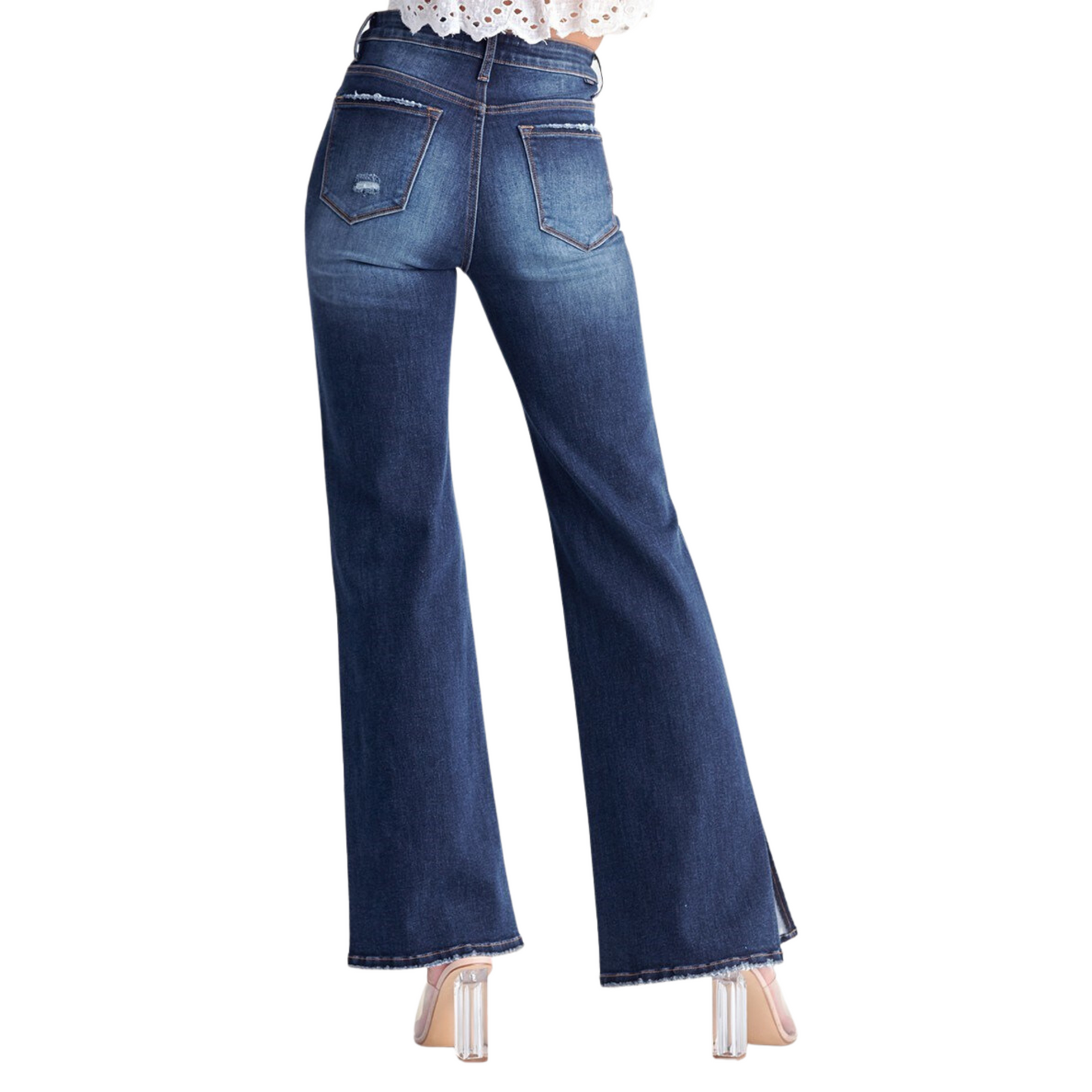 Our High Rise Distressed Wide Flare Jeans are the perfect combination of style and comfort, constructed from durable dark wash denim. The high rise accentuates your figure while the distressed details and wide flare provide an on-trend look. Dress it up or dress it down - you can't go wrong either way.