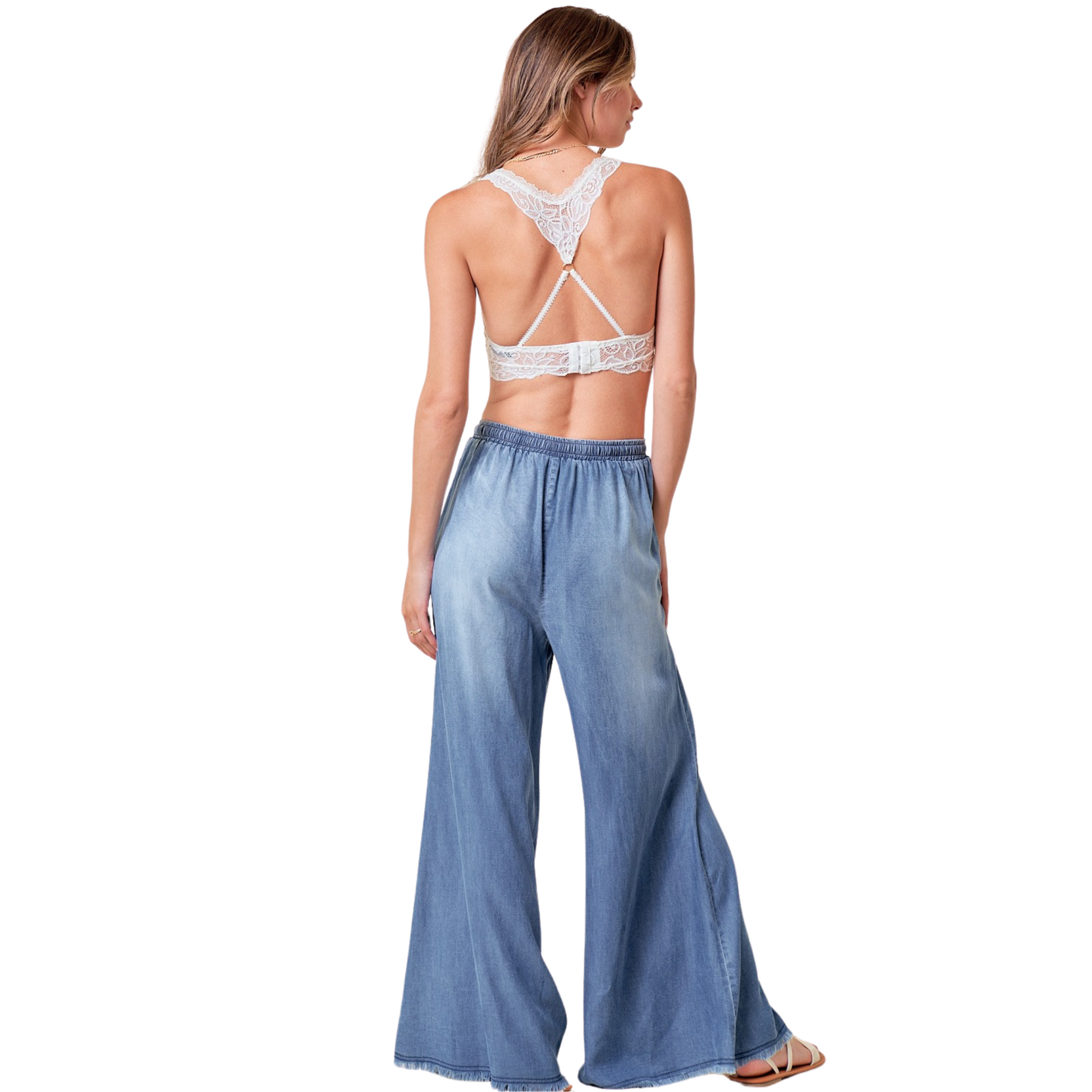 These wide leg denim pants are perfect for any casual outing. The light wash adds a touch of style while the drawstring allows for a customizable fit. Made from high-quality denim, these pants provide both comfort and fashion for any occasion.