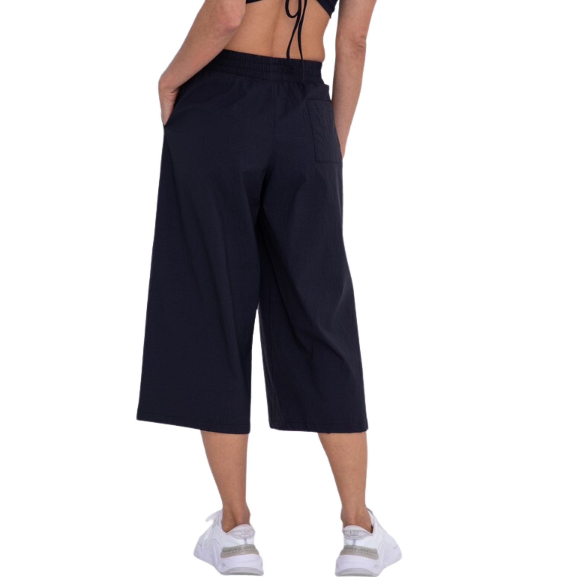 Made from a sturdy stretch rib stop fabric, these Cropped Wide Leg Pants are perfect for everyday wear. The elastic waistband provides a comfortable fit, while the faux fly stitching and slash pockets add subtle style. Plus, they're water-resistant and have a wide, cropped, flared leg for breathability. Enjoy the perfect balance of style and comfort.