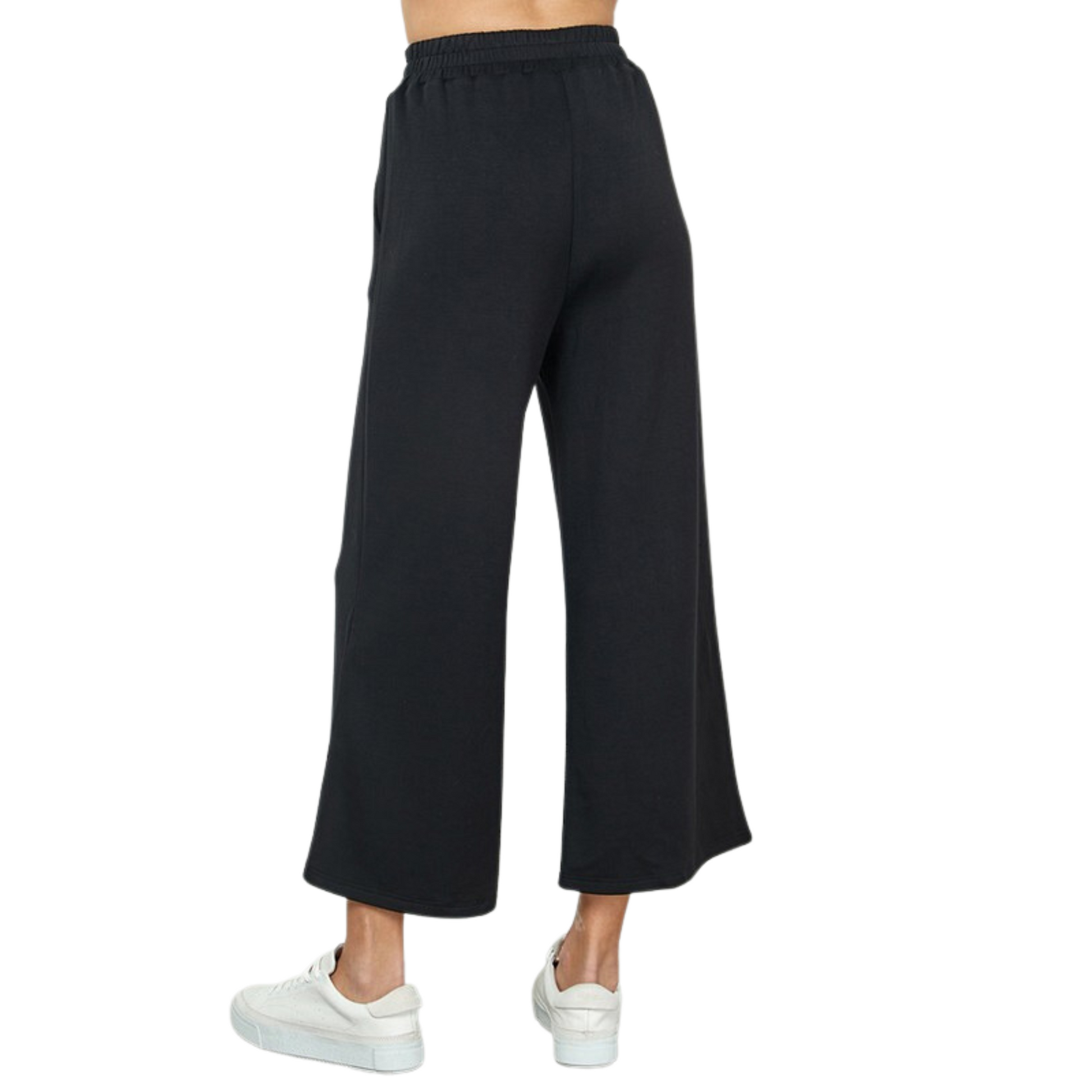 Our Plus size Cropped Wide Leg Pants are perfect for any occasion. Featuring a classic black color and super soft fabric, these pants have a flattering high waist and wide leg, providing a flexible, comfortable fit. They are cropped just above the ankle for a modern look.