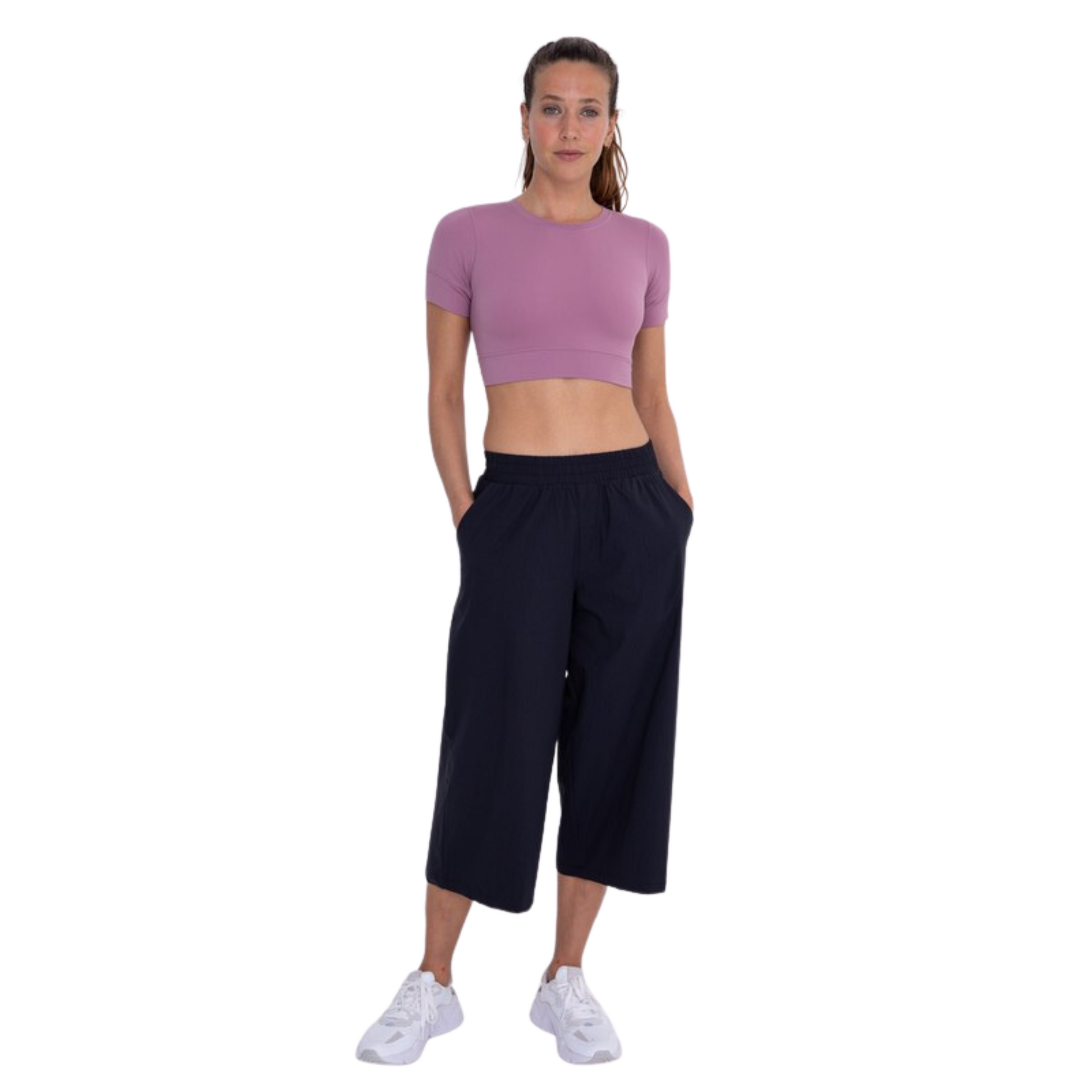 Made from a sturdy stretch rib stop fabric, these Cropped Wide Leg Pants are perfect for everyday wear. The elastic waistband provides a comfortable fit, while the faux fly stitching and slash pockets add subtle style. Plus, they're water-resistant and have a wide, cropped, flared leg for breathability. Enjoy the perfect balance of style and comfort.