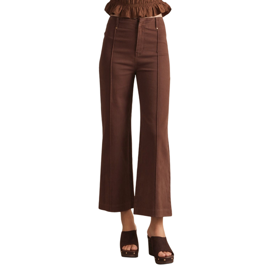 Elevate your wardrobe with these sophisticated high-rise wide-leg pants from Entro. Crafted in a rich brown tone, they feature a flattering front seam detail that creates a sleek silhouette. The lightweight, woven fabric drapes beautifully without clinging, while the unlined construction keeps you comfortable all day. Functional back patch pockets and a secure zip-fly button closure complete the design. Perfect for dressing up or down, these versatile trousers are a timeless essential.